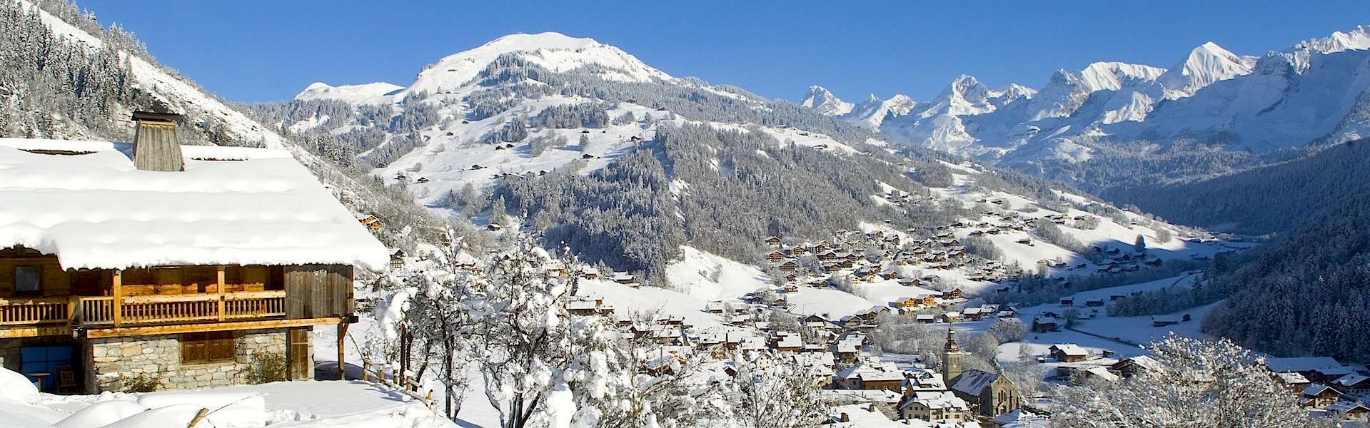 The village of La Clusaz under snow, facing the Aravis range