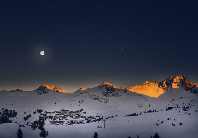 La Plagne at night, snow-covered plateau under the moon